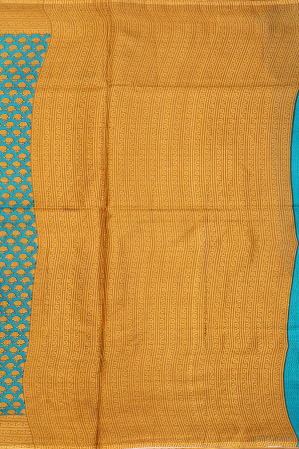 Printed Silk Saree In Peacock Green With Floral Buttas