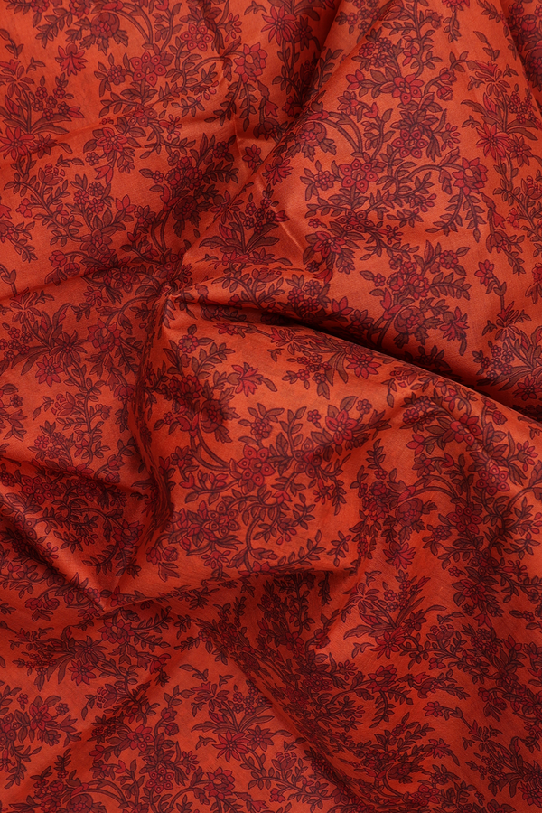 Printed Silk Saree In Spiced Orange With Floral Design