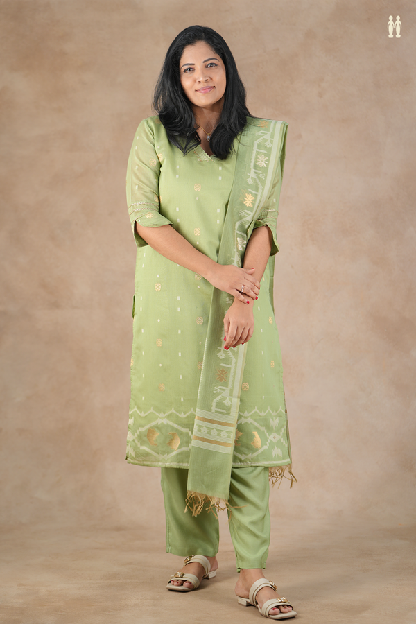 V-Neck Zari Buttas Green Sage Green Silk Cotton Salwar Set.