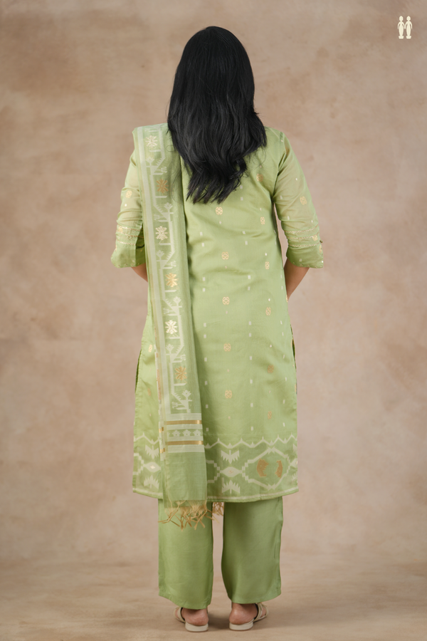 V-Neck Zari Buttas Green Sage Green Silk Cotton Salwar Set.
