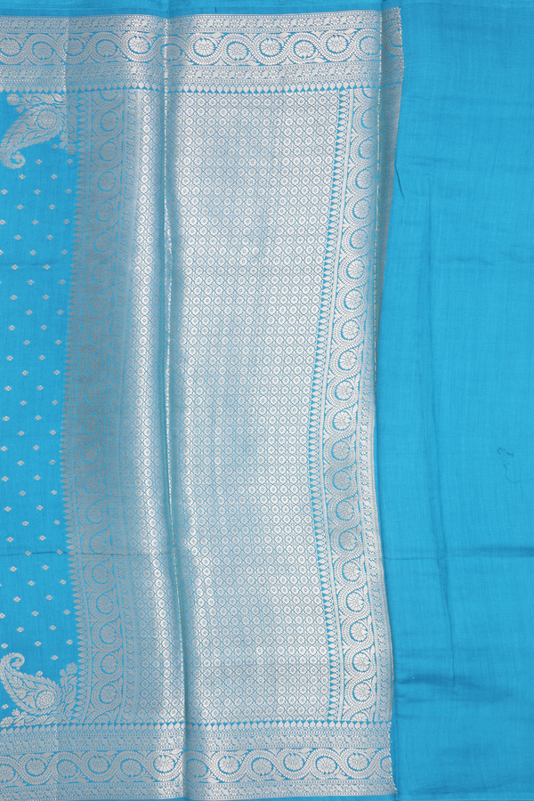 Raw Silk Saree In Deep Sky Blue With Floral Buttis