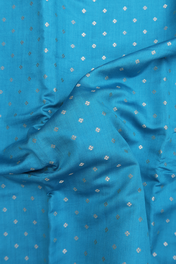 Raw Silk Saree In Deep Sky Blue With Floral Buttis