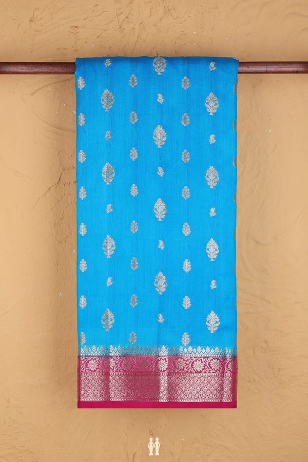 Raw Silk Saree In Cerulean Blue With Zari Buttas