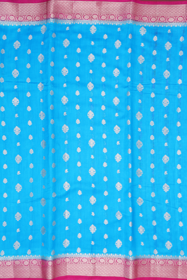 Raw Silk Saree In Cerulean Blue With Zari Buttas
