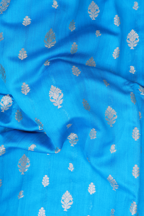 Raw Silk Saree In Cerulean Blue With Zari Buttas