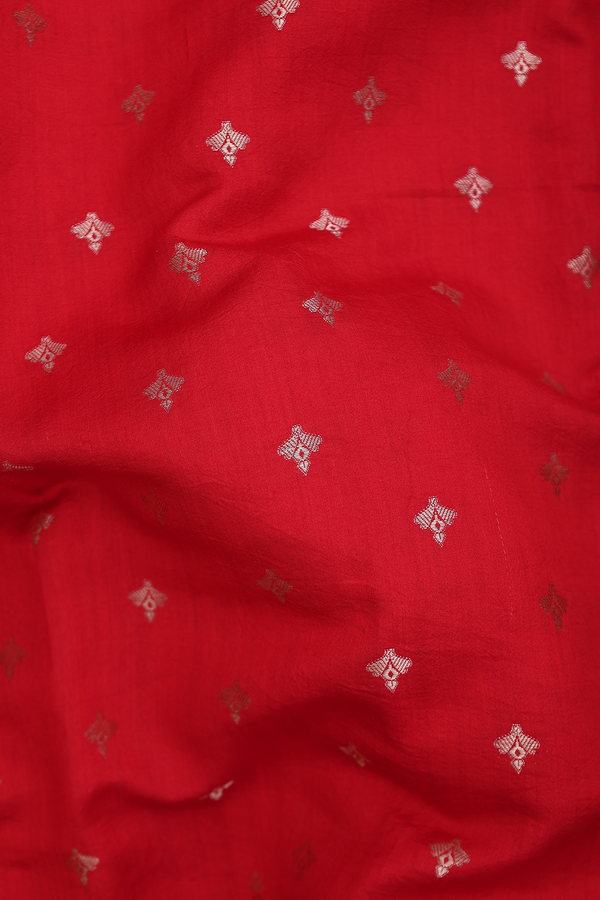 Raw Silk Saree In Chilli Red With Zari Buttas