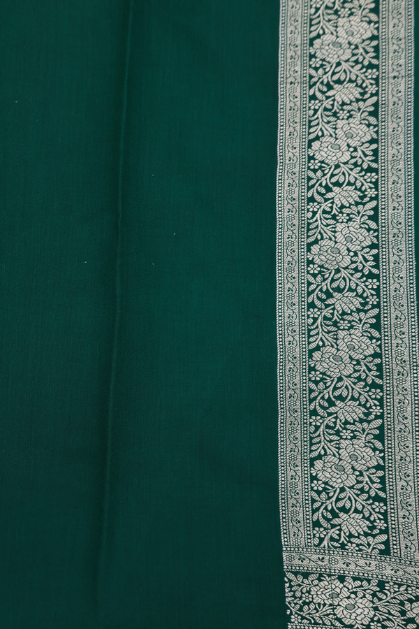 Raw Silk Saree In Dark Green With Floral Design