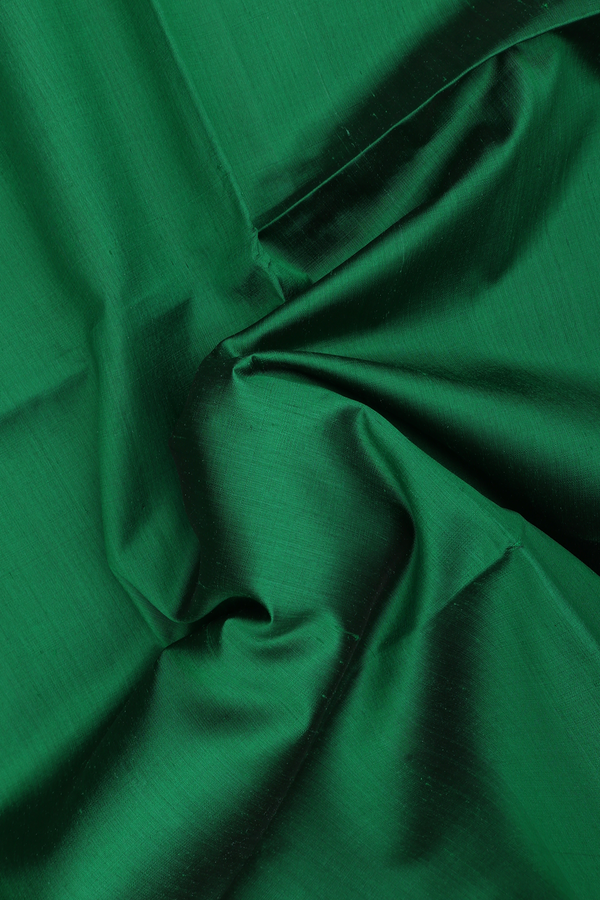 Raw Silk Saree In Emerald Green With Bavanchi Border