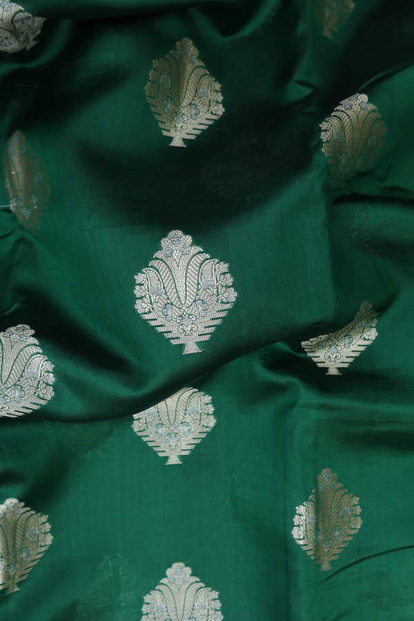 Raw Silk Saree In Forest Green With Zari Motifs