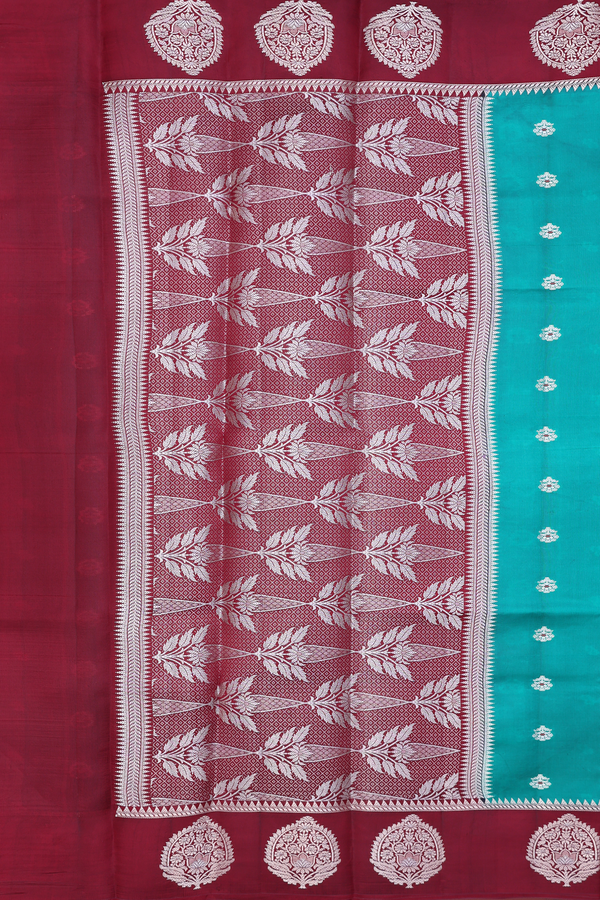 Raw Silk Saree In Green With Floral Buttas