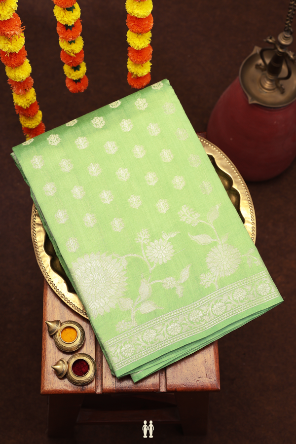 Raw Silk Saree In Moss Green With Floral Buttas
