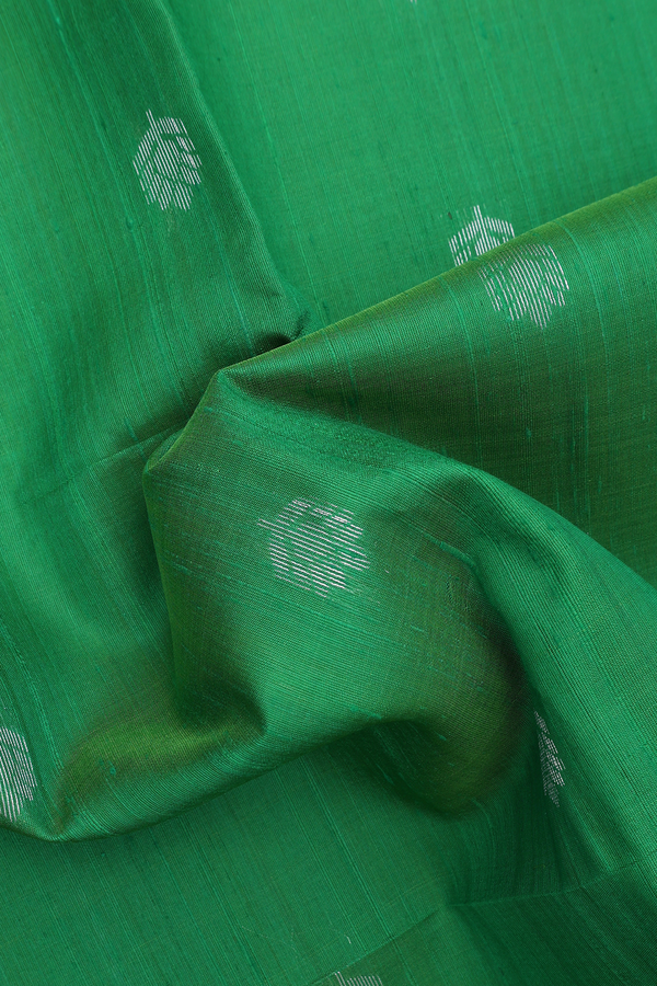Raw Silk Saree In Parrot Green With Floral Zari Buttas