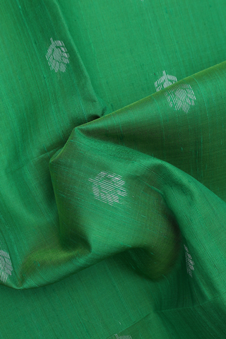 Raw Silk Saree In Parrot Green With Floral Zari Buttas