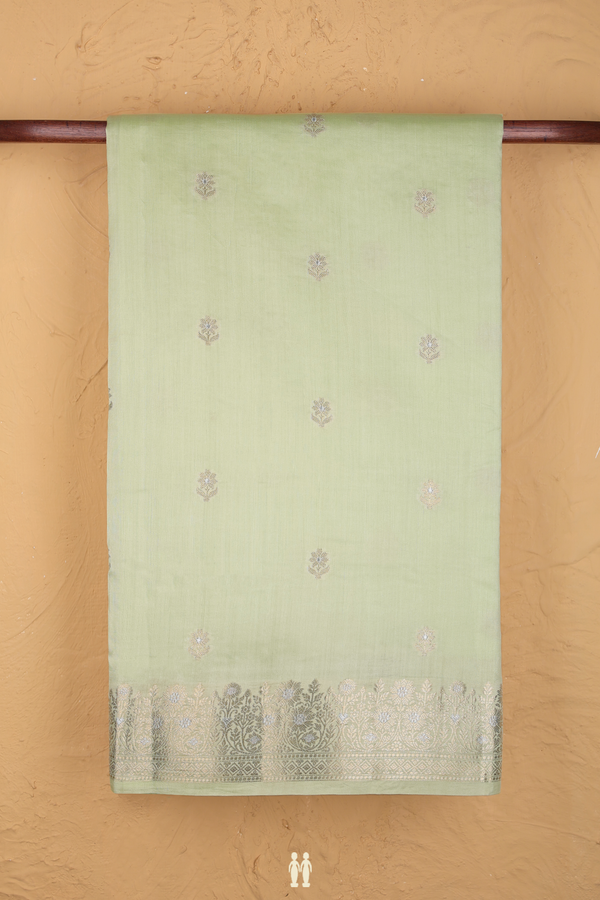 Raw Silk Saree In Pastel Green With Floral Buttas