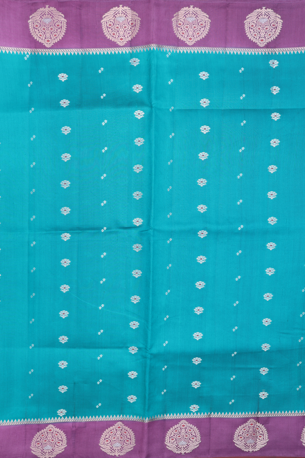 Raw Silk Saree In Peacock Green With Floral Buttas
