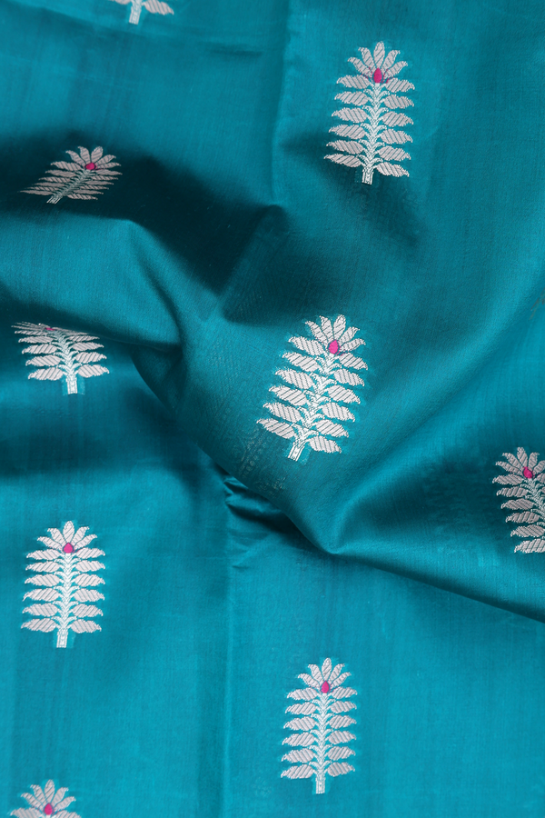 Raw Silk Saree In Peacock Green With Floral Motifs