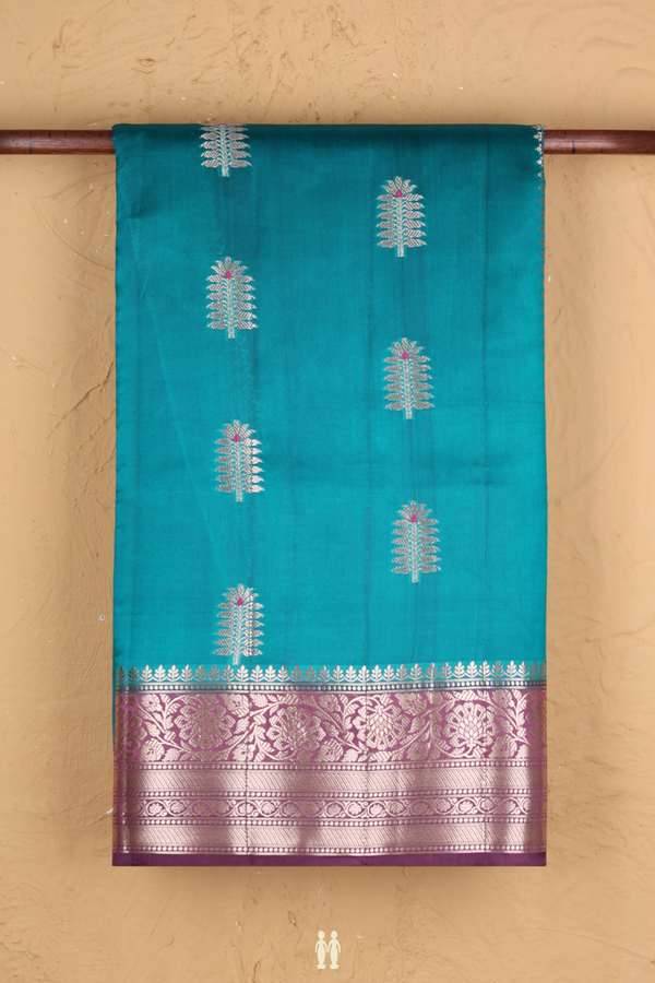Raw Silk Saree In Peacock Green With Floral Motifs