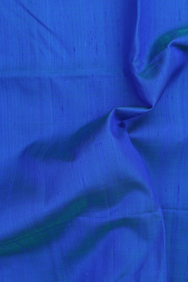 Raw Silk Saree In Plain Blue With Zari Border