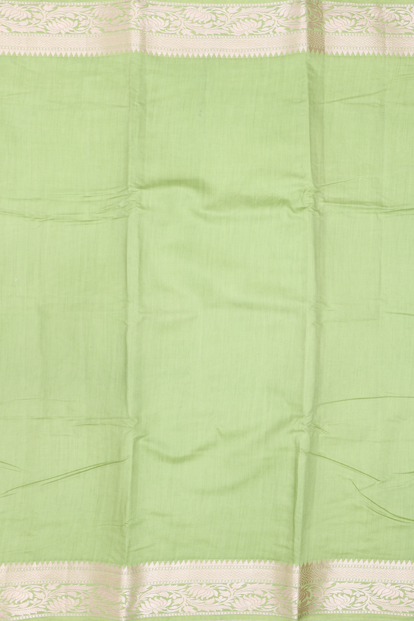 Raw Silk Saree In Plain Pastel Green With Floral Border