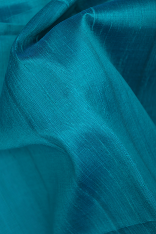 Raw Silk Saree In Plain Peacock Blue With Bavanchi Border