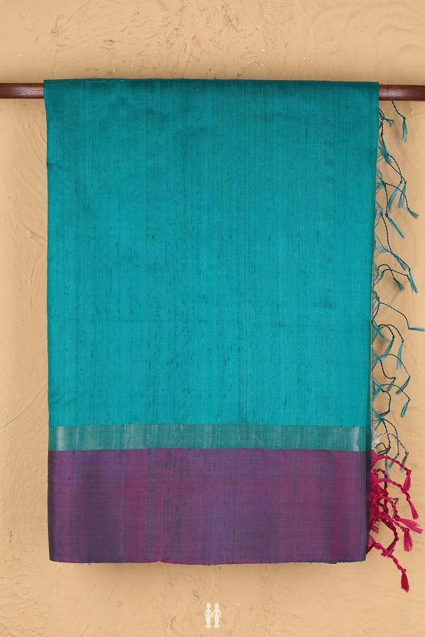 Raw Silk Saree In Plain Peacock Green With Contrast Border