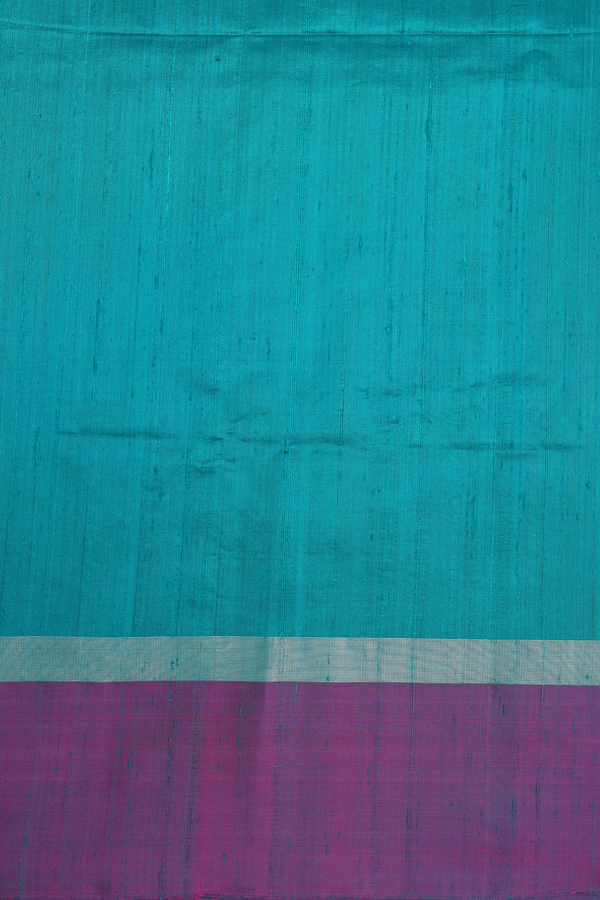 Raw Silk Saree In Plain Peacock Green With Contrast Border