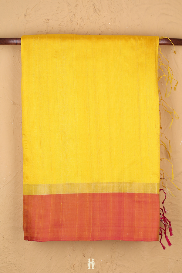 Raw Silk Saree In Plain Yellow With Contrast Border