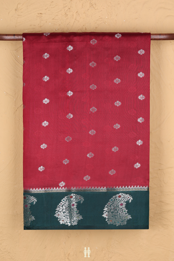 Raw Silk Saree In Red With Zari Buttas