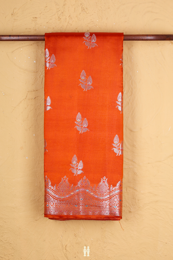 Raw Silk Saree In Rust Orange With Floral Buttas