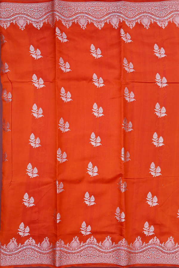 Raw Silk Saree In Rust Orange With Floral Buttas