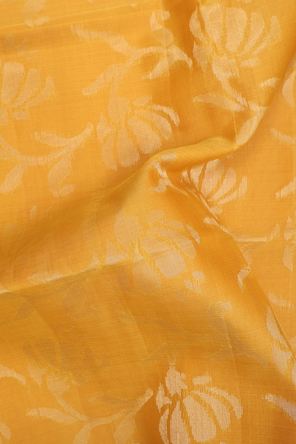 Raw Silk Saree In Saffron Yellow With Floral Design