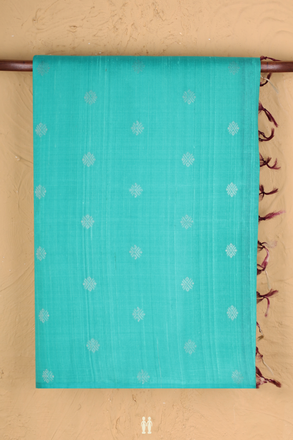 Raw Silk Saree In Sea Green With Floral Buttas