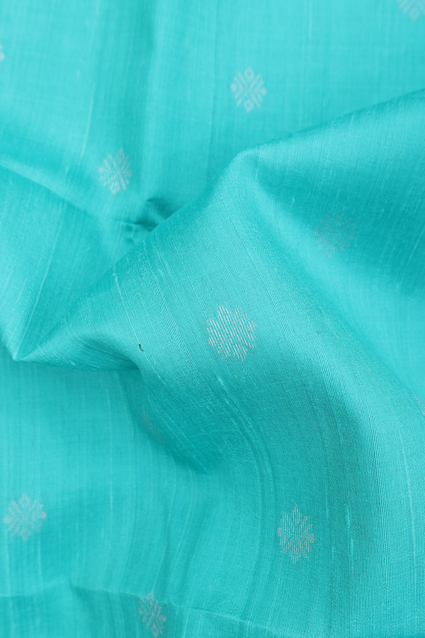 Raw Silk Saree In Sea Green With Floral Buttas