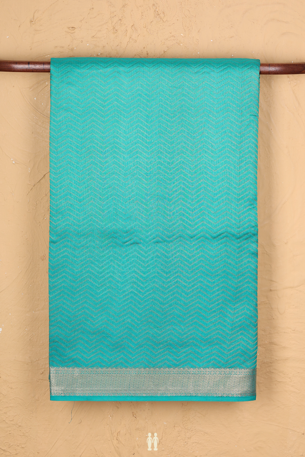 Raw Silk Saree In Shades Of Green With Chevron Design