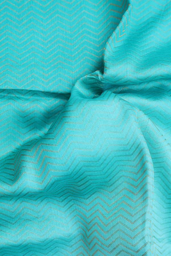 Raw Silk Saree In Shades Of Green With Chevron Design