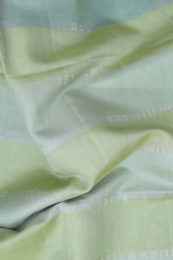 Raw Silk Saree In Shades Of Green With Stripes Design