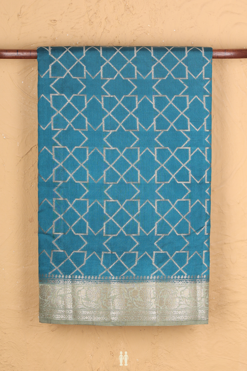 Raw Silk Saree In Teal Blue With Allover Design