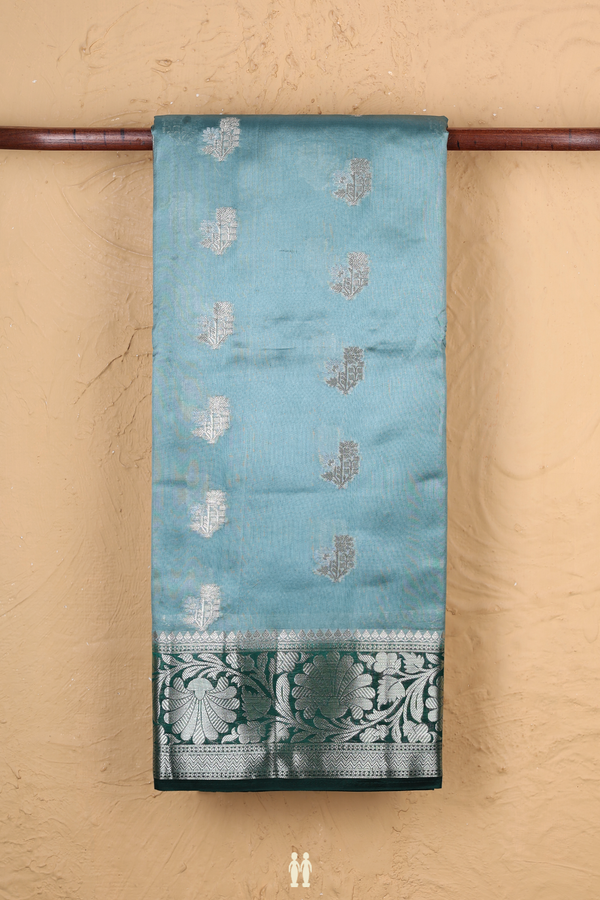 Raw Silk Saree In Turkish Blue With Floral Buttas