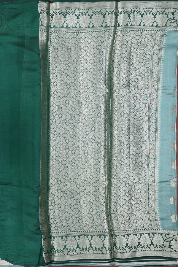 Raw Silk Saree In Turkish Blue With Floral Buttas