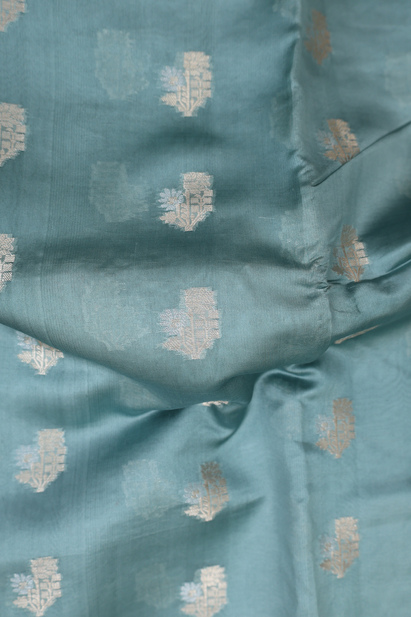 Raw Silk Saree In Turkish Blue With Floral Buttas