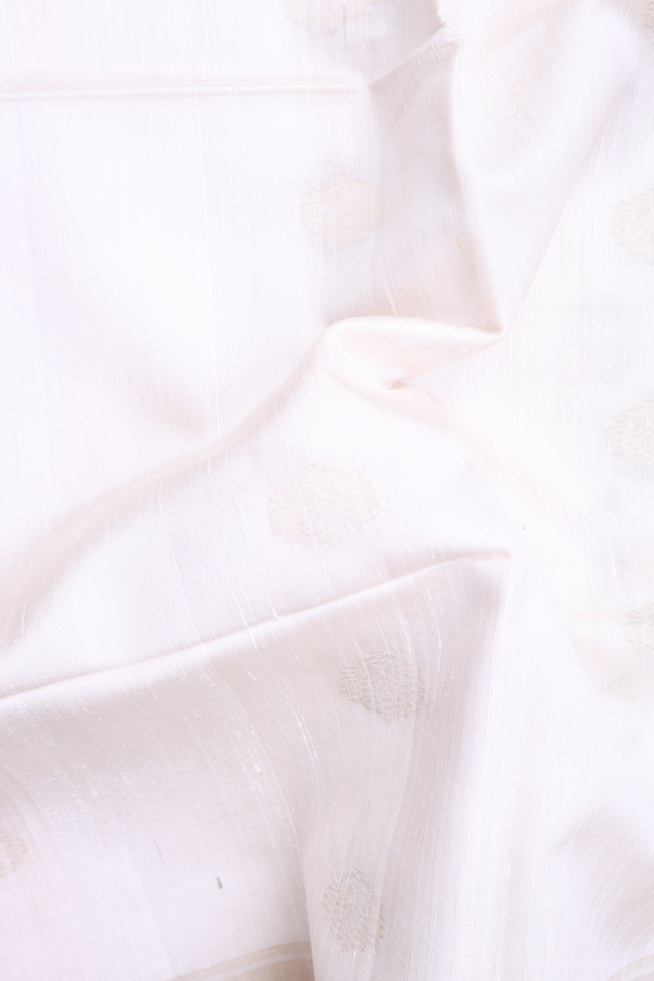 Raw Silk Saree In White With Zari Buttas