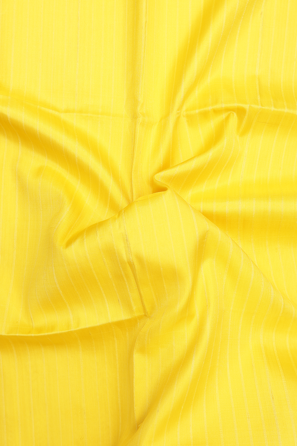 Raw Silk Saree In Yellow With Self Stripes Design