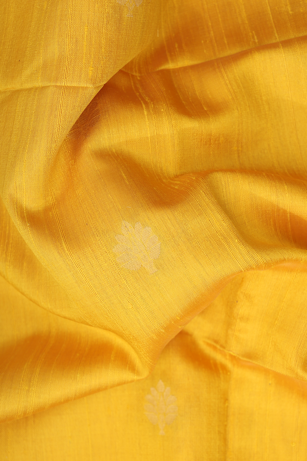 Raw Silk Saree In Yellow With Zari Buttas