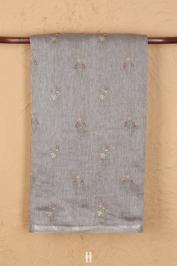 Linen Saree In Grey With Floral Embroidered Buttas