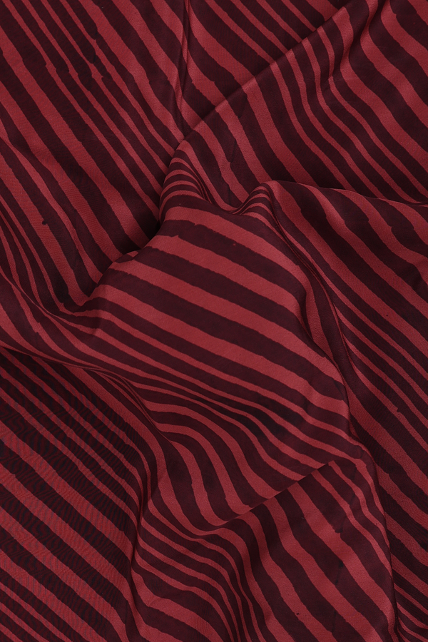 Crepe Saree In Dusty Red And Maroon With Diagonal Design