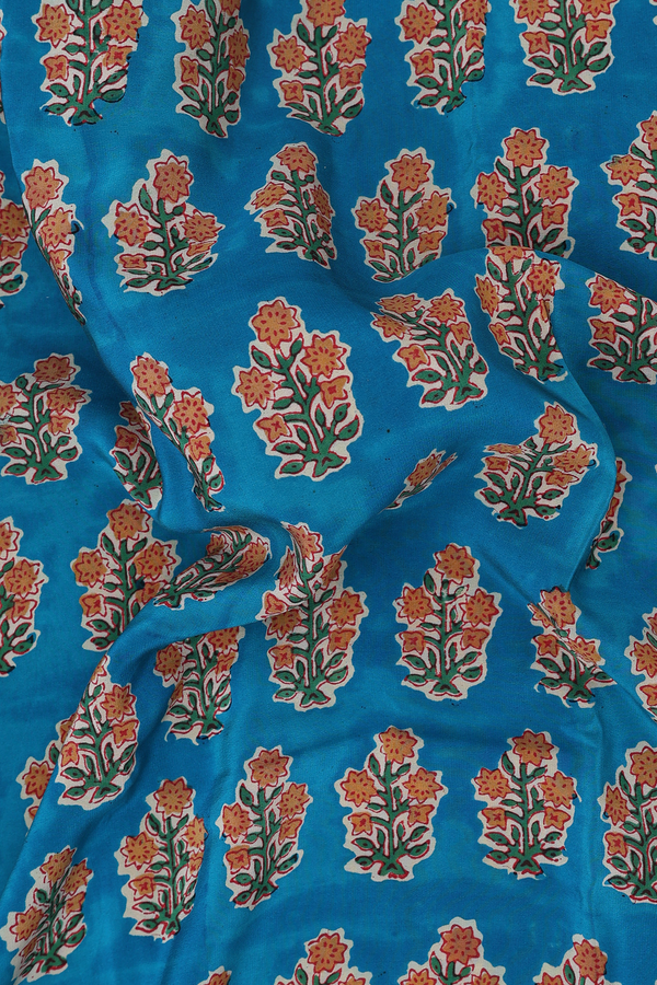 Crepe Saree In Peacock Blue With Floral Printed Design