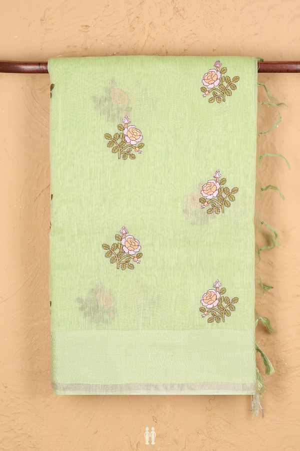 Linen Saree In Light Green With Floral Buttas