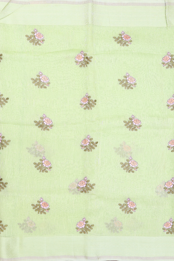 Linen Saree In Light Green With Floral Buttas