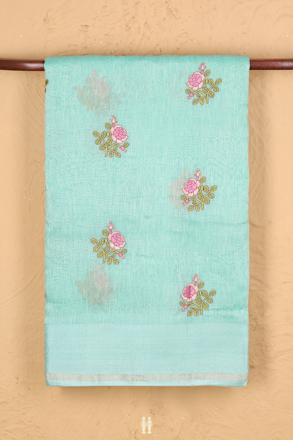 Linen Saree In Sea Green With Floral Embroidered Buttas