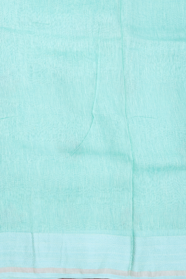 Linen Saree In Sea Green With Floral Embroidered Buttas